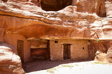 It's Red sandstone rocks in Petra (Rose City), Jordan. The city of Petra was lost for over 1000...