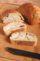 Ciabatta with black olives. Italian white bread.