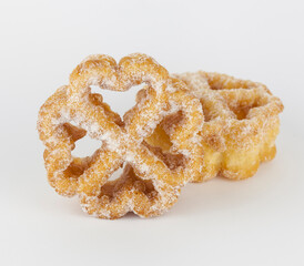 Two typical Spanish from La Mancha fried flowers covered with sugar.is one of the most typical desserts of Lent and Holy Week, this sweets come from the Arab tradition in medieval Spain