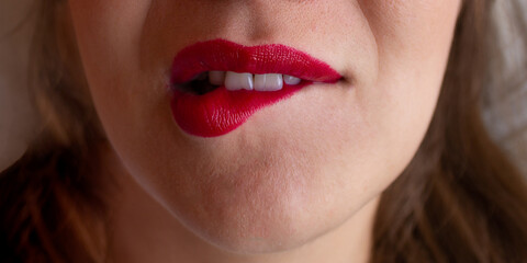 Fototapeta premium photo red lips of a young girl, sexy