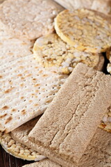 Different types of crispbread. Rice cake, Corn Thins, Matzo, Rye Crispbread.