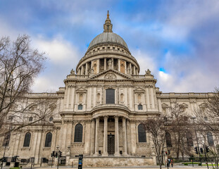 View of the famous St. Paul's Cathedral in city center on a cloudy day in London, England