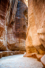 It's Canyon in Petra (Red Rose City). The city of Petra was lost for over 1000 years. Now one of the Seven Wonders of the Word