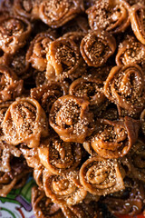 Moroccan food traditional sweet chebakia meal for Ramadan, a nutritious and delicious biscuit topped with honey and orange flower water and sesame seeds. Typical Morocco food stills backgrounds.
