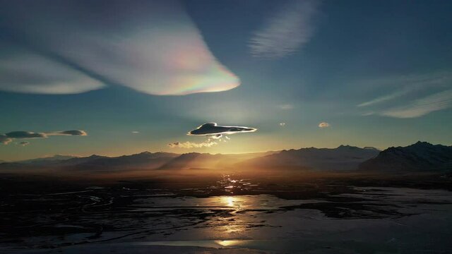 The polar stratospheric - nacreous clouds over Vatnajokull Glacier Cap in South Iceland - aerial