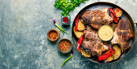 Grilled beef steaks in pan