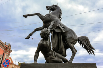 Horse tamers sculpture by Peter Klodt on Anichkov bridge built in 1841 in Saint Petersburg, Russia