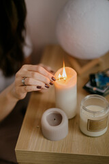 woman hands holding candle