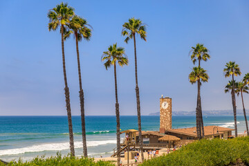 Beach in San Clemente, famous tourist destination in California, USA with the pier and a lifeguard tower - obrazy, fototapety, plakaty