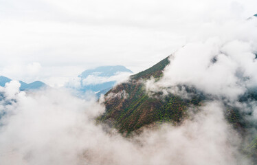 Yangtza river through the mountains with clouds