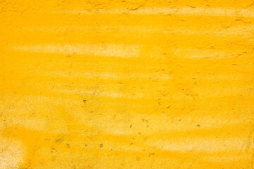 yellow painted plaster wall texture