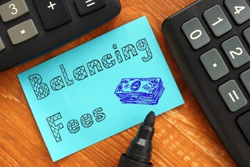 Business concept about Balancing Fees with sign on the piece of paper.