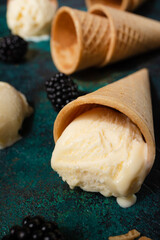 Vanilla ice cream with wafer cup with a trendy hard color.