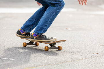 person is riding on the skateboard