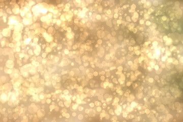A festive abstract delicate golden yellow gradient background texture with glitter defocused sparkle bokeh circles. Card concept for Happy New Year, party invitation, valentine or other holidays.