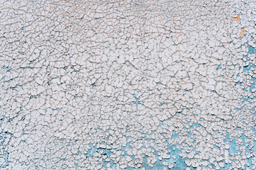 Old cracked paint on a wooden wall
