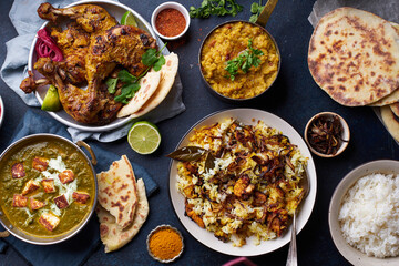 Indian cuisine dinner: tandoori chicken, biryani