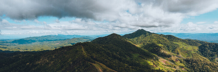 Mountains and green trees during the day
