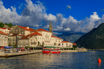 Fototapeta na wymiar Scenic view of the postcard perfect historic town of Perast in the Bay of Kotor on a sunny day in the summer, Montenegro