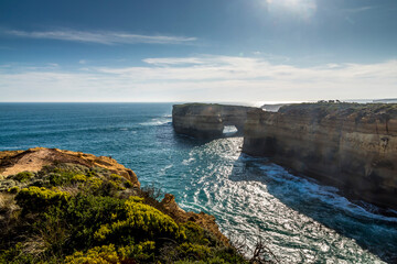 Fototapeta na wymiar View from the Great Ocean Road over the coast near to the London Bridge in Victoria, Australia at a sunny day in summer.