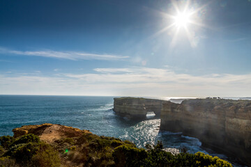 Naklejka premium View from the Great Ocean Road over the coast near to the London Bridge in Victoria, Australia at a sunny day in summer.