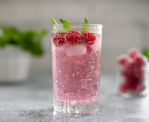 raspberry lemonade with fresh raspberries and mint