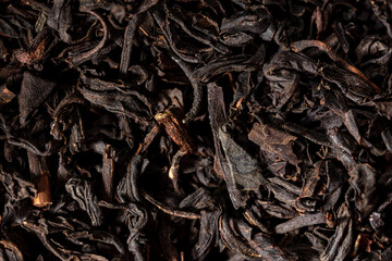 Close up of granules of black tea as a background.