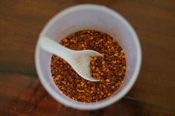 ground coffee in a wooden spoon