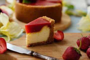Cold cheesecake with strawberry jelly.