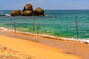 Fishermen sticks on the Sand Coast of Sri Lanka.