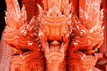 Close view of red dragon with 3 heads sculpture in Ko Samui, Thailand
