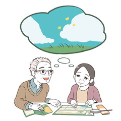 計画を立てるシニア世代(草原)