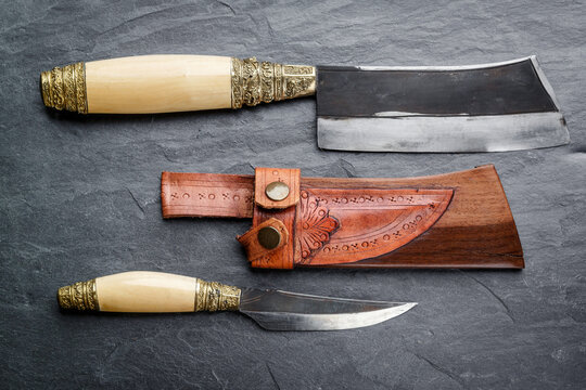 Traditional handmade  balinese knife belakas on a slate background