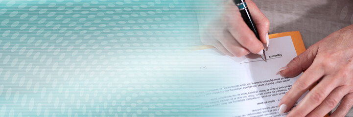 Hand of businesswoman signing a document; panoramic banner