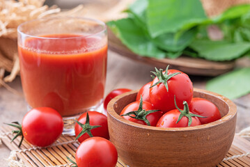 Tomato juice. Tomato juice on wooden background.