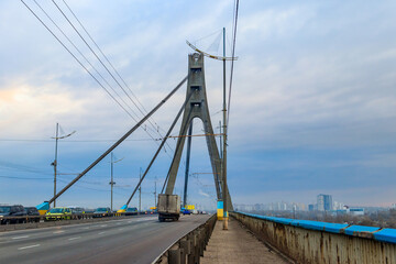 Fototapeta na wymiar North bridge (Moscow bridge) across the Dnieper river in Kiev, Ukraine