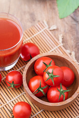 Tomato juice. Tomato juice on wooden background.