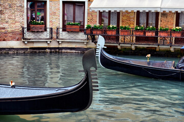 Fototapeta na wymiar Gondolas on canal in Venice