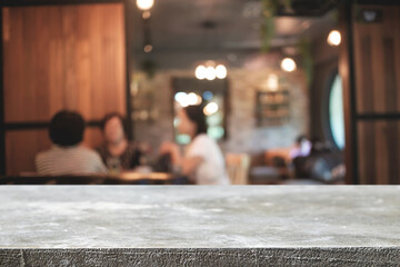 Empty wooden desk space platform and blurred restaurant or coffee shop background for product display montage.
