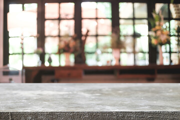 Empty wooden desk space platform and blurred restaurant or coffee shop background for product display montage.