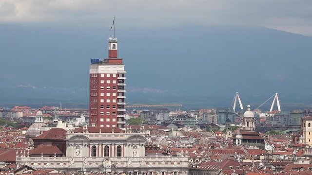 Turin, Italy, Littoria tower view from hill with mountain on background