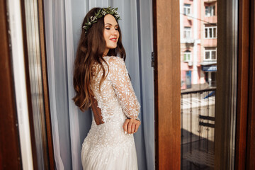 Fototapeta premium Young beautiful bride with long hair and amazing make-up 