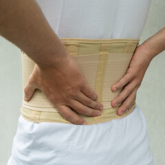 Trauma of back. Corset for posture. Orthopedic belt for muscle back