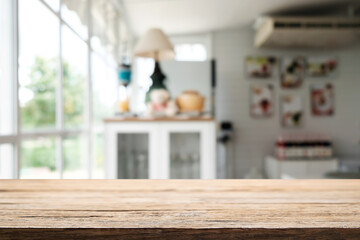 Empty wooden table space platform and blurred restaurant or coffee shop background for product display montage.