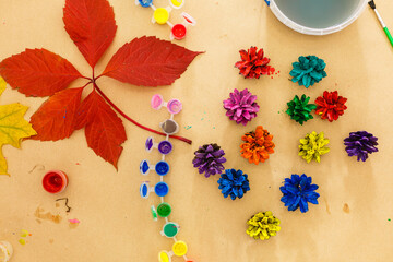 paint for coloring leaves and cones. Autumn background about creativity, return to school. Save the space back to school