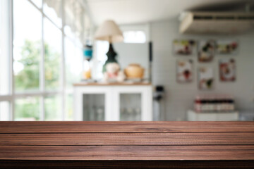 Empty wooden table space platform and blurred restaurant or coffee shop background for product display montage.