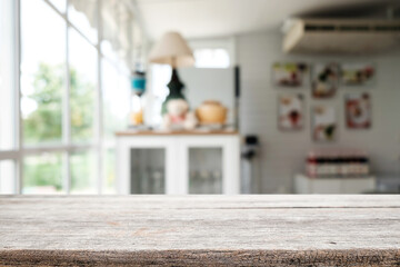 Empty wooden table space platform and blurred restaurant or coffee shop background for product display montage.