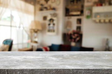 Wooden desk space platform and blurred restaurant or coffee shop background for product display montage.