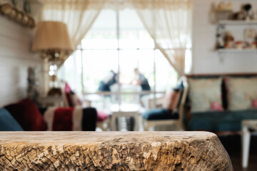 Empty wooden table space platform and blurred restaurant or coffee shop background for product display montage.