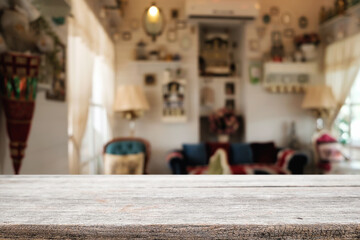 Wooden table space platform and blurred restaurant or coffee shop background for product display montage.